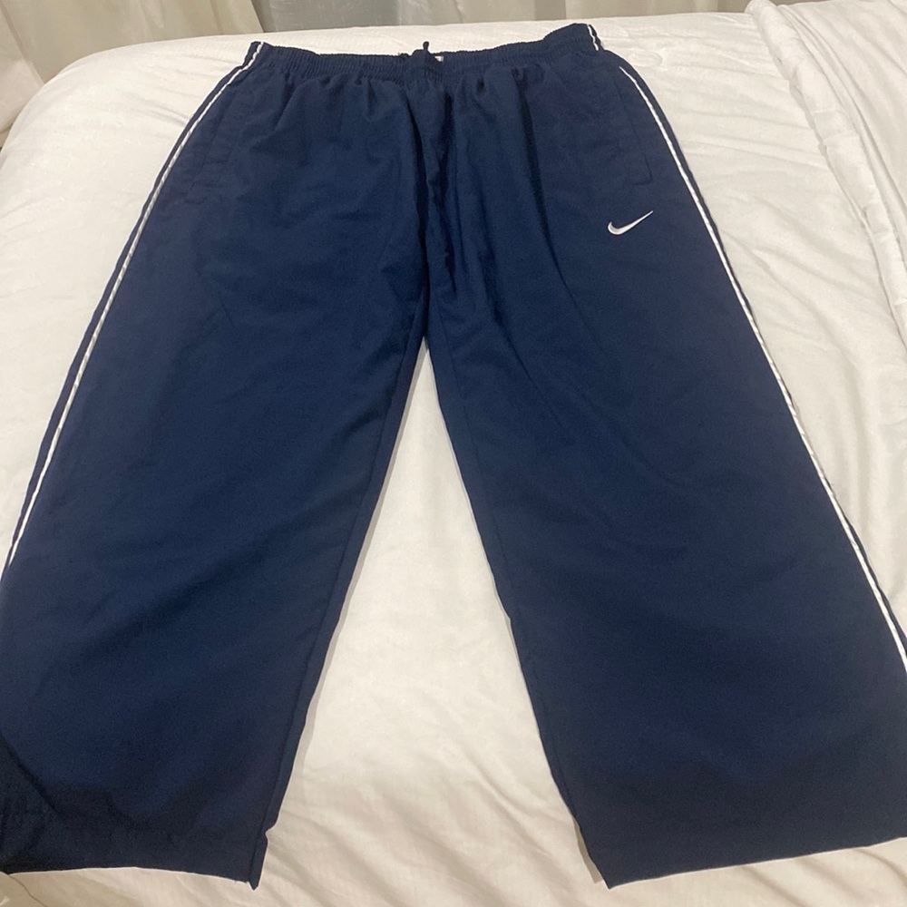 Vintage blue swoosh Nike track pants